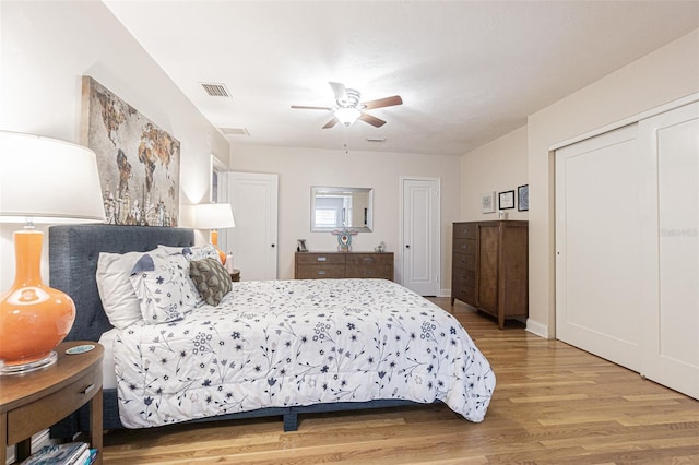 bedroom featuring ceiling fan and hardwood / wood-style floors