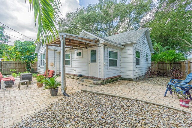 rear view of house with a patio area