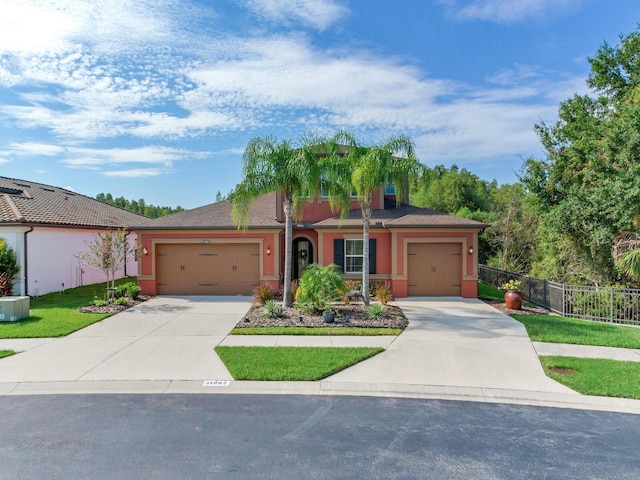 ranch-style home featuring a garage