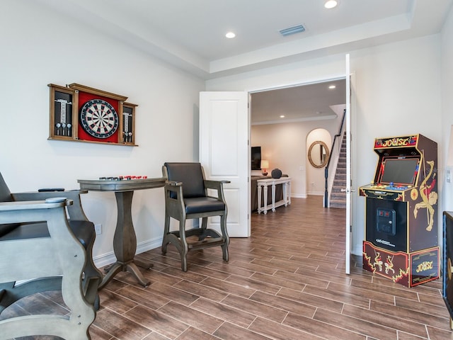 home office with wood-type flooring