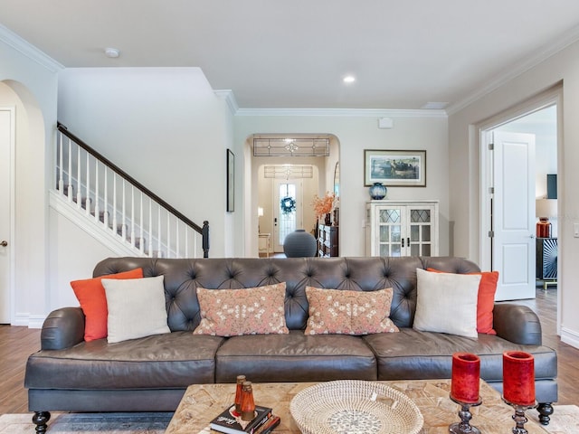 living room featuring ornamental molding and hardwood / wood-style floors