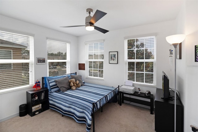 bedroom featuring carpet floors and ceiling fan