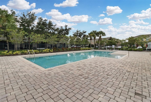 view of swimming pool featuring a patio