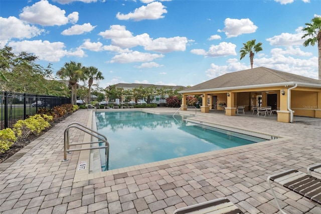 view of swimming pool featuring a patio