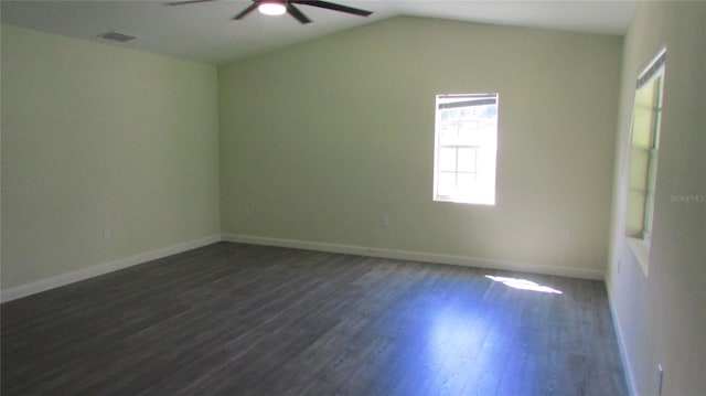 3225 Oakland Rd N, Lakeland, FL 33801 - empty room featuring ceiling fan, dark wood-type flooring, visible vents, lofted ceiling, and baseboards