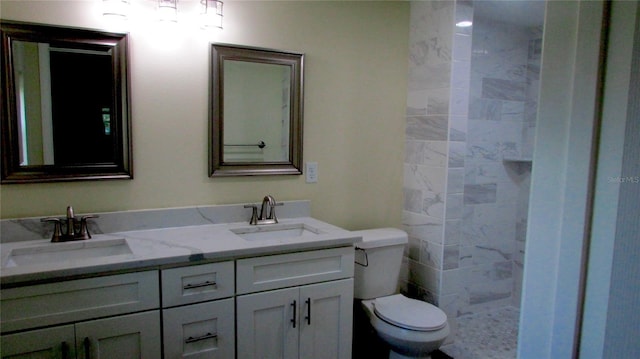 3225 Oakland Rd N, Lakeland, FL 33801 - full bathroom with double vanity, a sink, and toilet