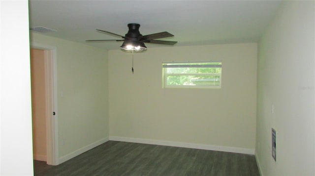 3225 Oakland Rd N, Lakeland, FL 33801 - empty room with visible vents, baseboards, a ceiling fan, and dark wood finished floors