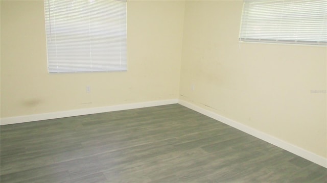 3225 Oakland Rd N, Lakeland, FL 33801 - unfurnished room with wood finished floors and baseboards