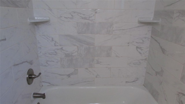 3225 Oakland Rd N, Lakeland, FL 33801 - full bathroom featuring washtub / shower combination