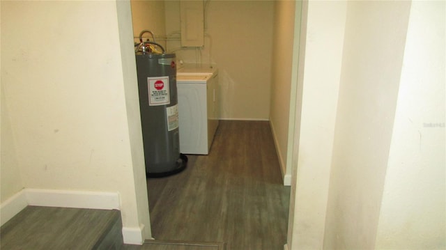 3225 Oakland Rd N, Lakeland, FL 33801 - hall featuring wood finished floors, baseboards, washer / dryer, and water heater
