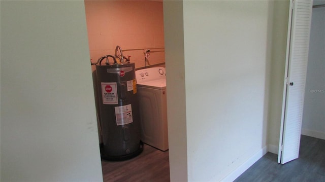 3225 Oakland Rd N, Lakeland, FL 33801 - laundry area with washer / clothes dryer, laundry area, dark wood-style floors, and water heater
