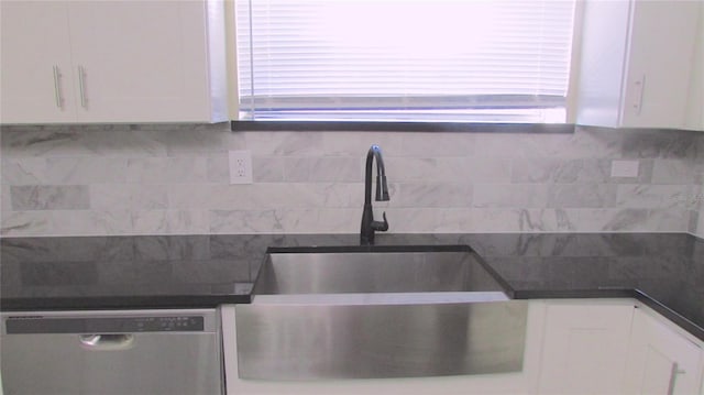 3225 Oakland Rd N, Lakeland, FL 33801 - kitchen featuring dishwasher, white cabinetry, a sink, and dark countertops