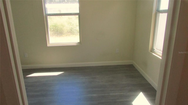 3225 Oakland Rd N, Lakeland, FL 33801 - empty room featuring wood finished floors and baseboards
