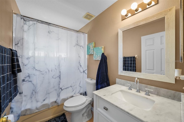 full bathroom featuring vanity, toilet, and shower / bathtub combination with curtain