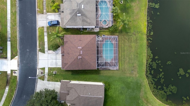 drone / aerial view featuring a water view