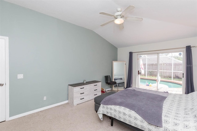 bedroom featuring ceiling fan, access to exterior, light colored carpet, and vaulted ceiling