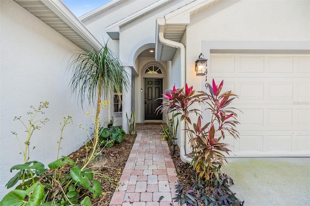 entrance to property with a garage