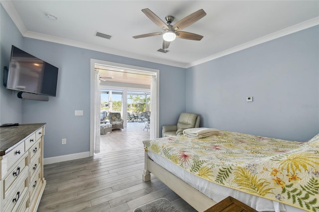 bedroom with ornamental molding, light wood-type flooring, ceiling fan, and access to exterior