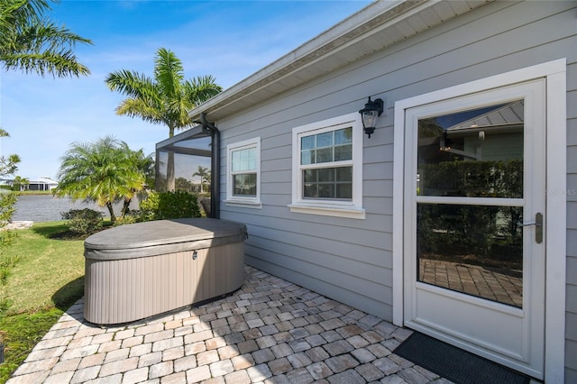 view of patio / terrace featuring a hot tub