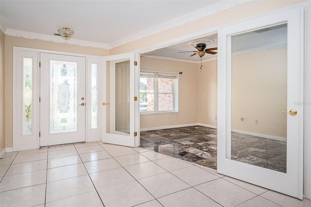 foyer featuring ceiling fan and crown molding