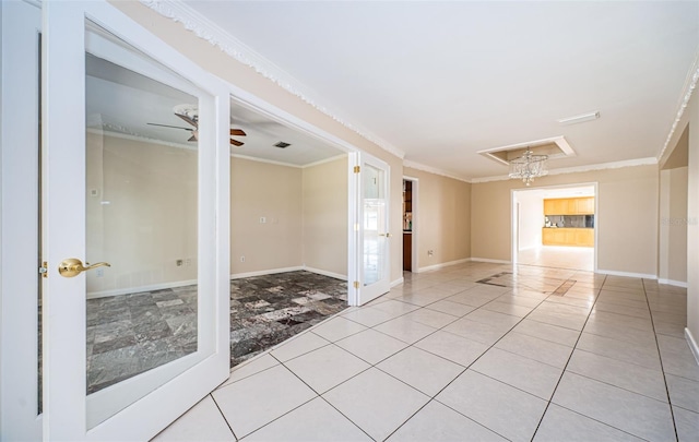 empty room with ceiling fan and ornamental molding