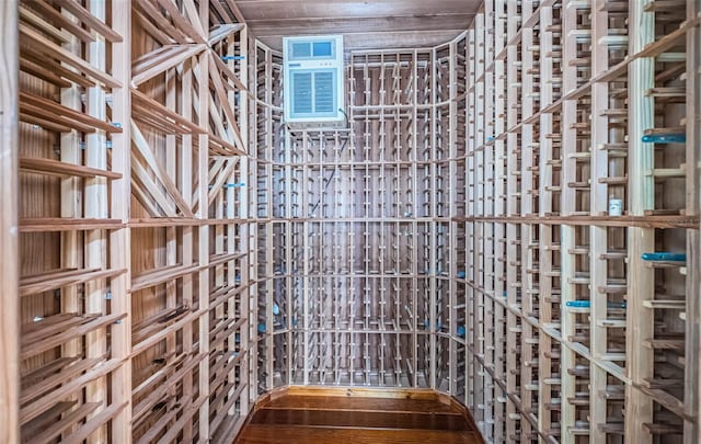 wine cellar with hardwood / wood-style floors