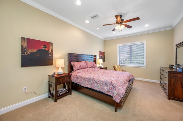 bedroom featuring light carpet, ceiling fan, and crown molding