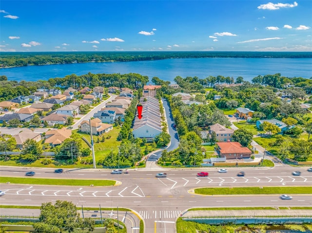 birds eye view of property featuring a water view