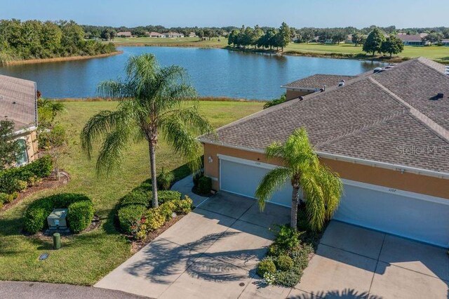 drone / aerial view featuring a water view