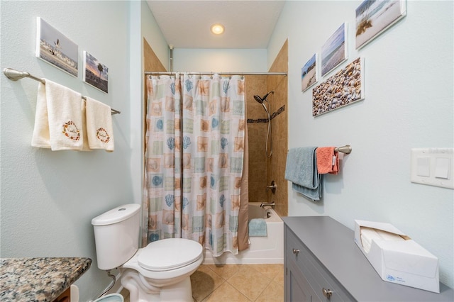 full bathroom with vanity, tile patterned floors, toilet, and shower / bath combo