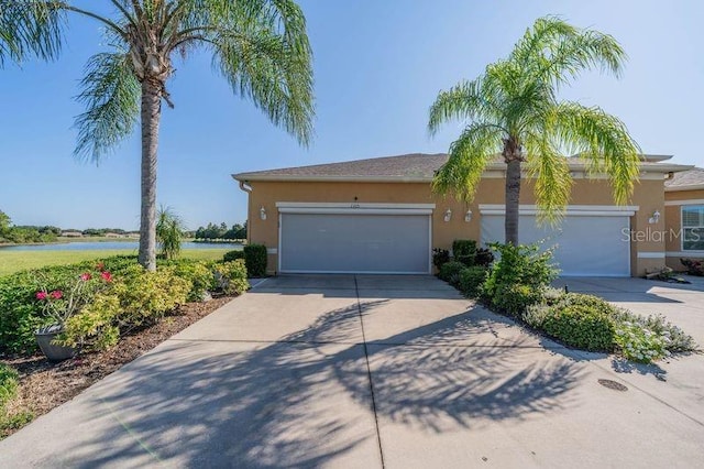 single story home featuring a garage