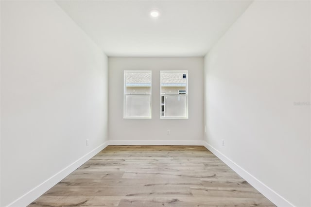 unfurnished room featuring light hardwood / wood-style flooring