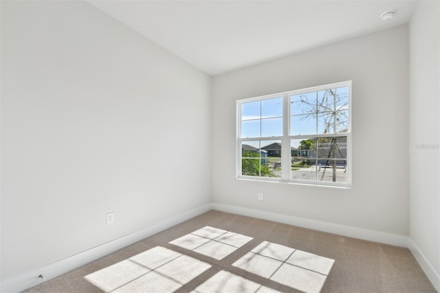 view of carpeted spare room