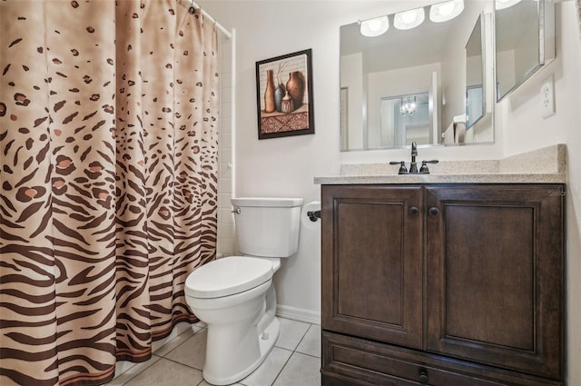 bathroom with vanity, toilet, a shower with curtain, and tile patterned flooring