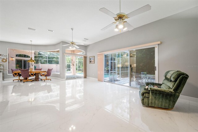 living room with ceiling fan