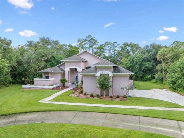 view of front of house with a front lawn