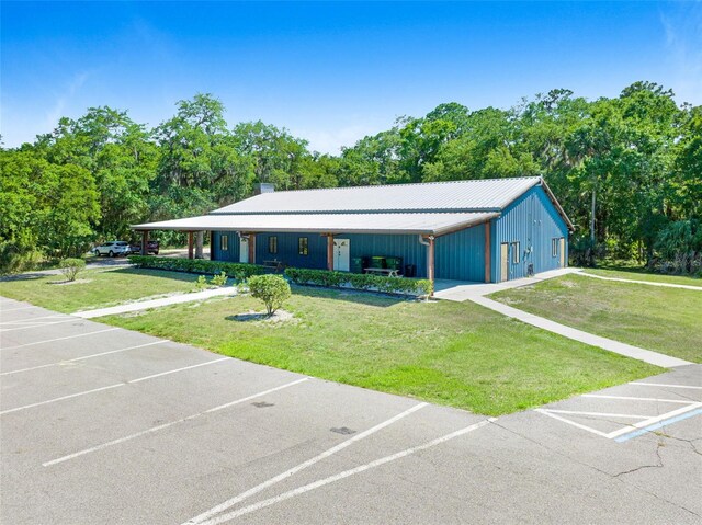 view of front of property with a front lawn