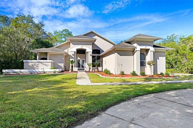 view of front of house with a front lawn