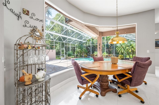 sunroom with a swimming pool