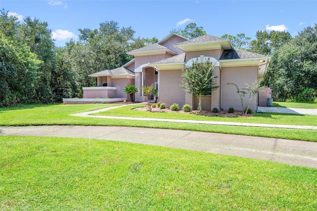 view of front of house with a front lawn