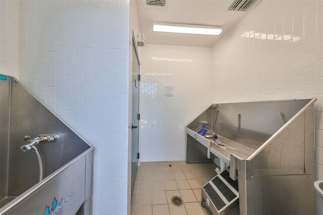 16850 Whisper Elm St, Wimauma, FL 33598 - misc room featuring tile patterned flooring and pet washing area