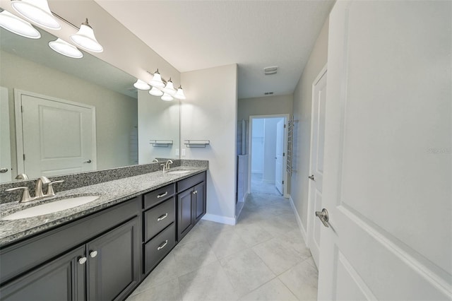 bathroom featuring vanity and tile patterned floors