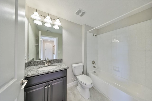 full bathroom with toilet, tiled shower / bath combo, tile patterned flooring, and vanity