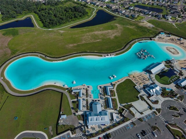 16850 Whisper Elm St, Wimauma, FL 33598 - aerial overview of property's location with a nearby body of water and a pool