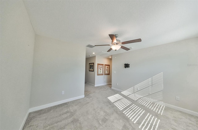16850 Whisper Elm St, Wimauma, FL 33598 - empty room featuring a ceiling fan, light colored carpet, baseboards, and recessed lighting