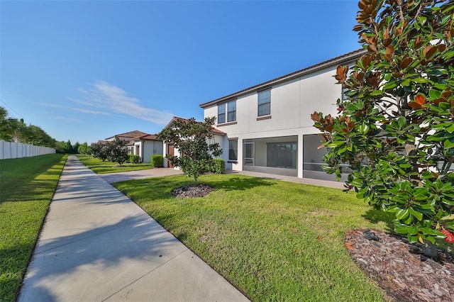 view of front of home featuring a front lawn