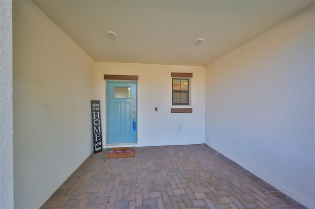 16850 Whisper Elm St, Wimauma, FL 33598 - property entrance featuring stucco siding
