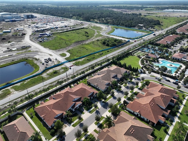 16850 Whisper Elm St, Wimauma, FL 33598 - aerial view of property's location featuring a large body of water and nearby suburban area