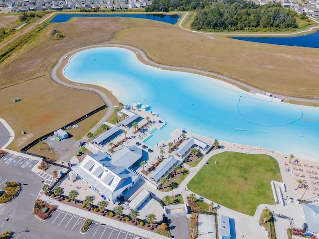 birds eye view of property featuring a water view