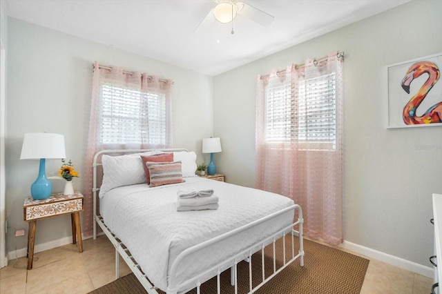 bedroom featuring tile patterned flooring and ceiling fan